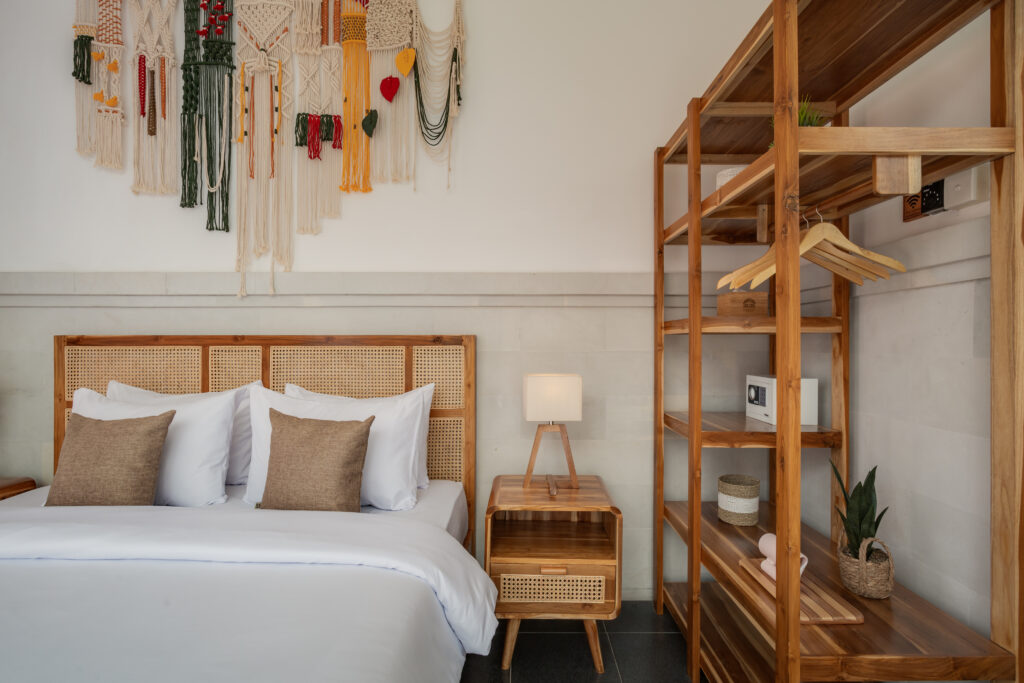 A styled bedroom at a SANTAI STAYS villa
